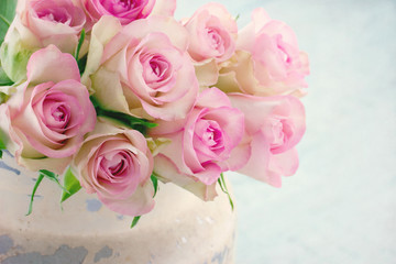 Pink roses in a shabby chic metal bucket - Powered by Adobe