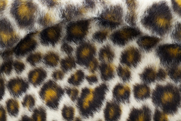 close up shot of fake leopard tiger fur texture background