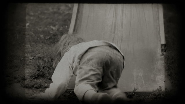 Children spending time in playground slide. Vintage 8 mm footage