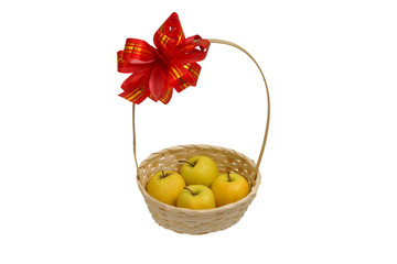 four apples in a basket with a bow