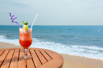 banana daiquiri cocktail with ice on the table