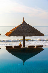 pool and umbrellas on the sky