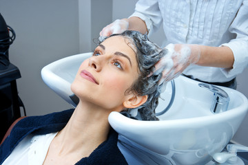 attractive woman washing her hair