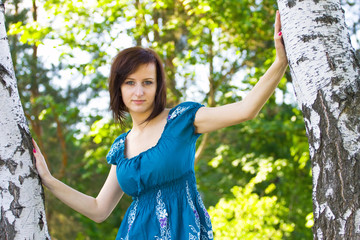 Fototapeta premium Fashion portrait of young sensual woman in garden. 