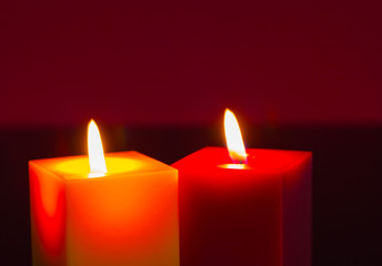 Two burning candles