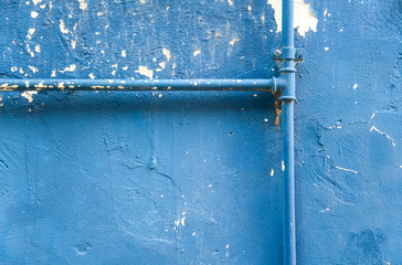 Tube on a grunge wall