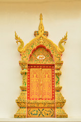 Thai art wooden window  temple in Chiangmai Top North Thailand.