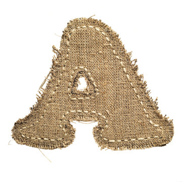 letter clipped from linen fabric