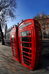Old red phone boxes in London, England