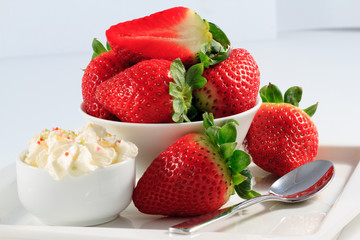 Dessert, fresh strawberries and whipped cream