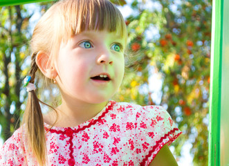 Summer portrait of a cute little girl