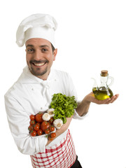 Funny chef with tomatoes, olive oil, garlic and salad