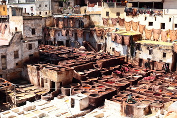 Old tanks of the Fez's tanneries with color paint for leather