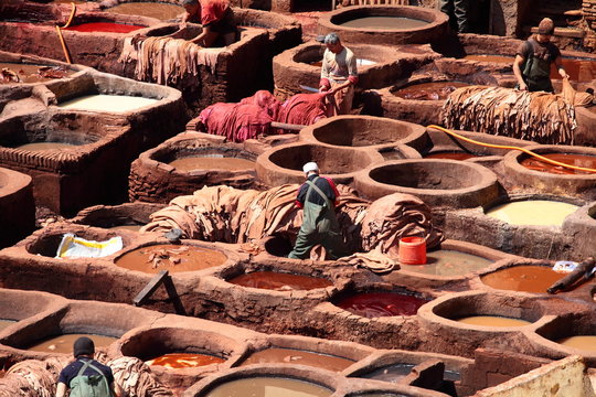 Old tanks of the Fez's tanneries with color paint for leather