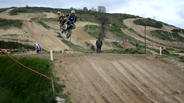 motocross competition, first lap