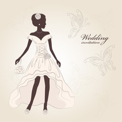 Beautiful bride  in an elegant dress and stylish boots.