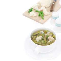 vegetable soup with cauliflower and green beans isolated