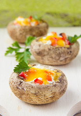 Baked mushrooms stuffed with cheese and vegetables
