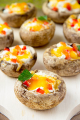 Baked mushrooms stuffed with cheese and vegetables