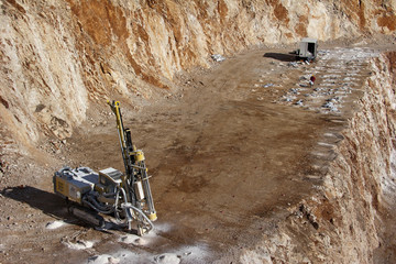 Drilling holes for demolition in a quarry near Split in Croatia