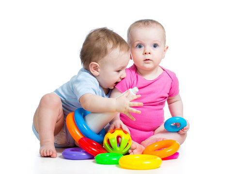 kids boy and girl playing toys together