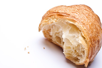 Fresh and tasty croissant over white background 