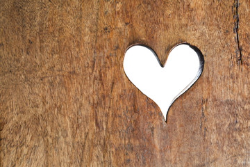 Naklejka na ściany i meble Heart symbol wood hole