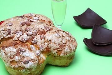 Colomba (Italian Easter cake) and pieces of chocolate Easter egg