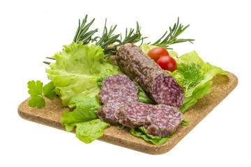 Salami with rosemary, salad and tomatoes