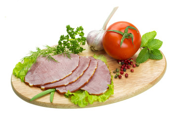 Ripe fresh ham with vegetables