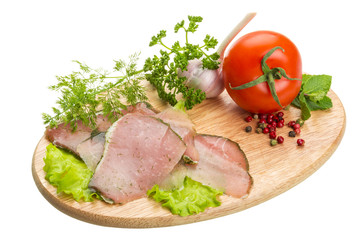 Ripe fresh ham with vegetables