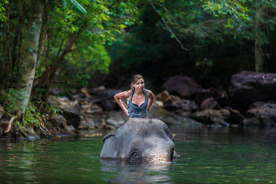 the girl with the elephant in the water