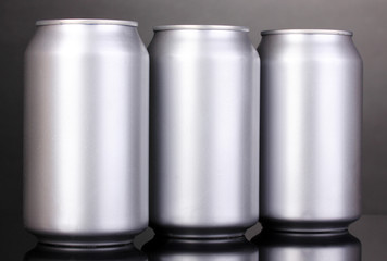 aluminum cans on grey background