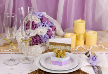 Serving fabulous wedding table in purple and gold color