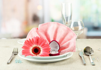 Table serving on bright background