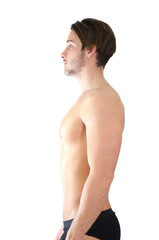 Shirtless young man showing proper standing position or posture