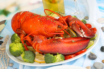 Red lobster on platter on serving table close-up
