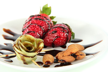 Fruit in chocolate isolated on white