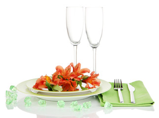 Festive table setting with flowers isolated on white