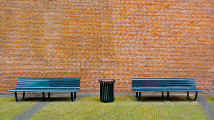 Bench and Brick Wall