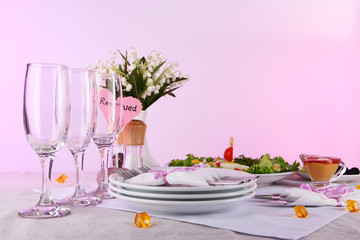 Table setting on yellow background