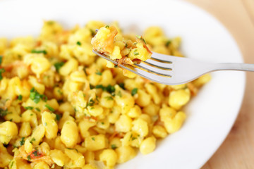 noodles with grated cheese - Käsespätzle