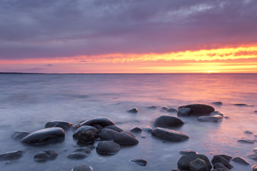 Fototapeta na wymiar Twilight ocean scene, coastline of Sweden