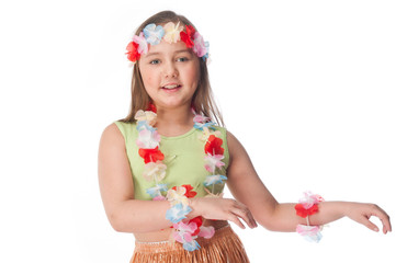 Small and beautiful girl in Hawaiian dress