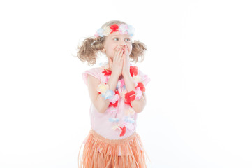 Small and beautiful girl in Hawaiian dress