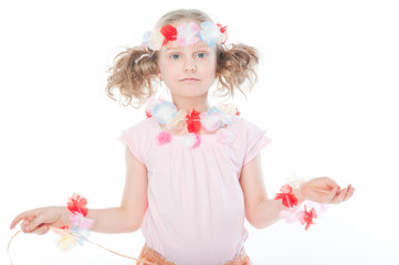 Small and beautiful girl in Hawaiian dress