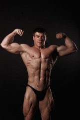 Fototapeta na wymiar Poto of naked athlete with strong body