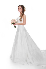 Obraz na płótnie Canvas Beautiful bride in luxurious wedding dress isolated on white bac