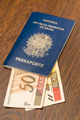 Brazilian Passport with real bills