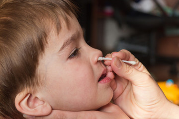 cleaning baby's nose